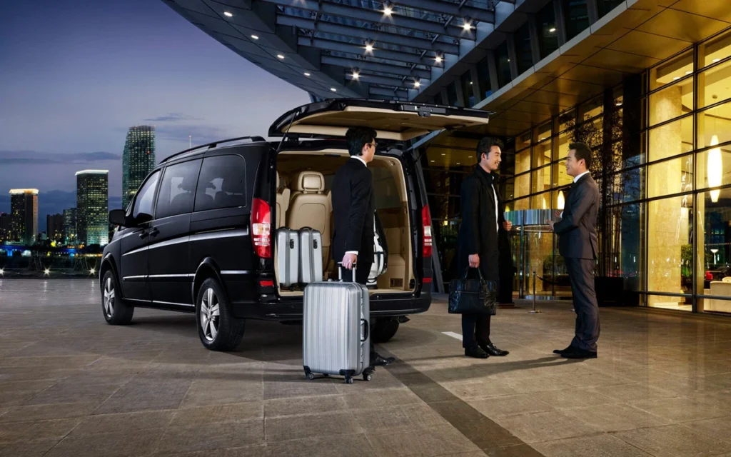 Black Mercedes V-Class at Frankfurt Airport terminal – Frankfurt Airport transfer with luggage